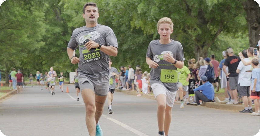 running coach keeping pace with let me run boy