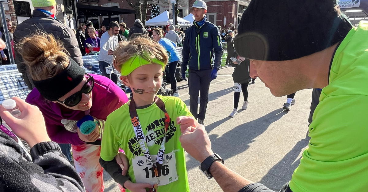 let me run coach fist bumping runner