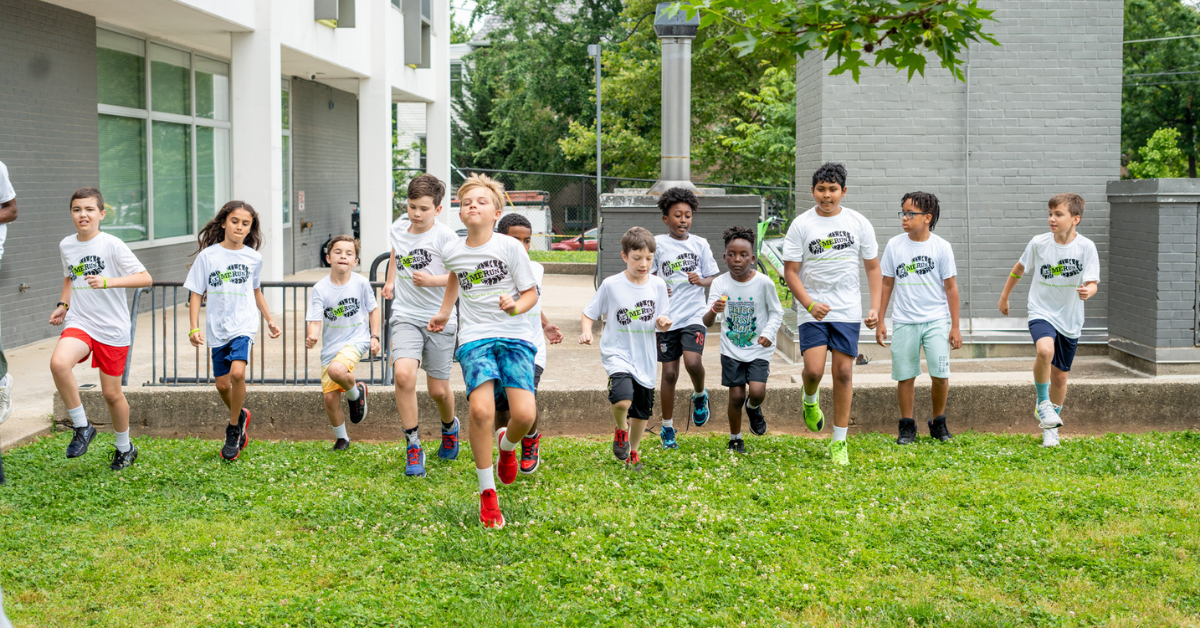 let me run coach fist bumping runner